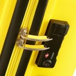 American Tourister Bon Air Spinner négy kerekes gurulós kemény fedeles bőrönd poggyász sárga